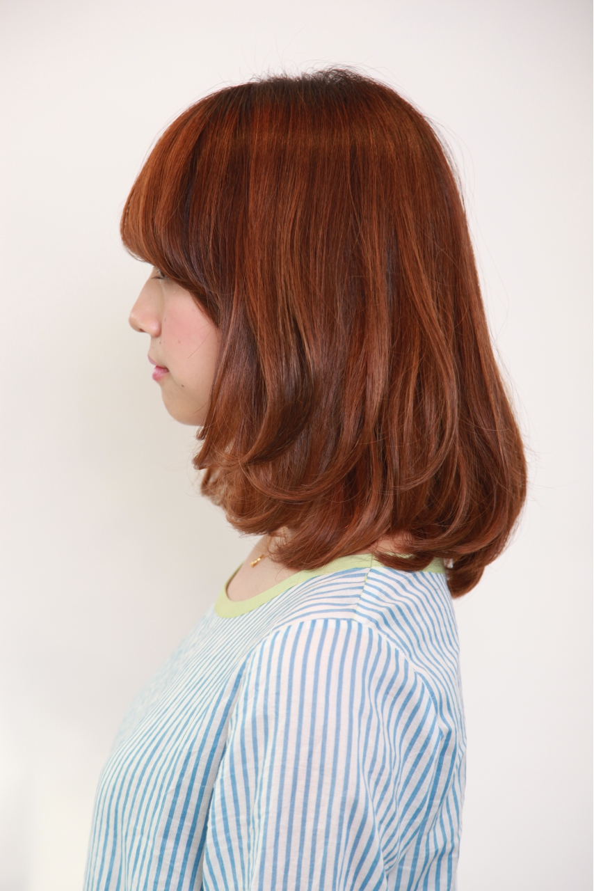 大人カワイイ内巻きミディ